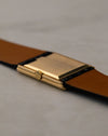 Rear angled view of Rolex Cellini 4016 showing polished gold caseback and stepped rectangular case construction