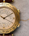 Close-up of Van Cleef & Arpels Traveller dial and engraved city ring showing world time cities including Paris, London, and New York