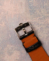 Underside view of the original Rolex 18K white gold buckle showing hallmarks and signature.