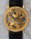 Macro detail of the skeleton dial, highlighting engraved bridges, jewel settings, and the intricate finishing of the movement.