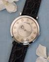 Front view of Jaeger-LeCoultre mystery watch in 14K white gold with diamond hour markers and floating diamond hands