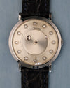 Straight-on dial view showing the LeCoultre mystery dial with suspended diamond hour and minute indicators