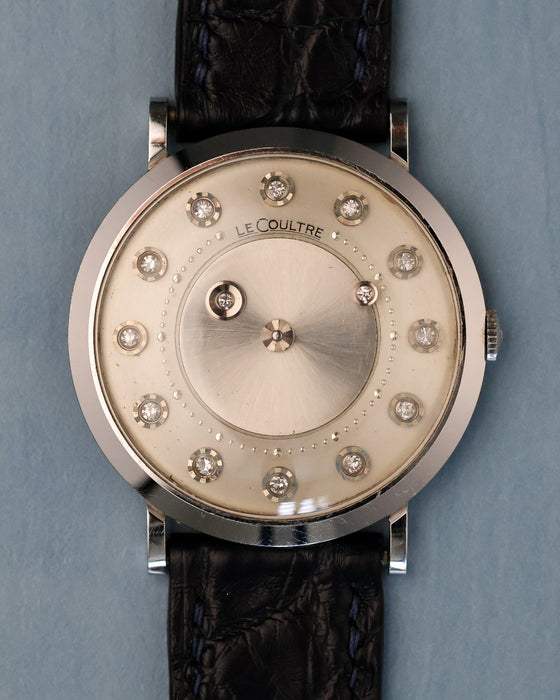 Straight-on dial view showing the LeCoultre mystery dial with suspended diamond hour and minute indicators