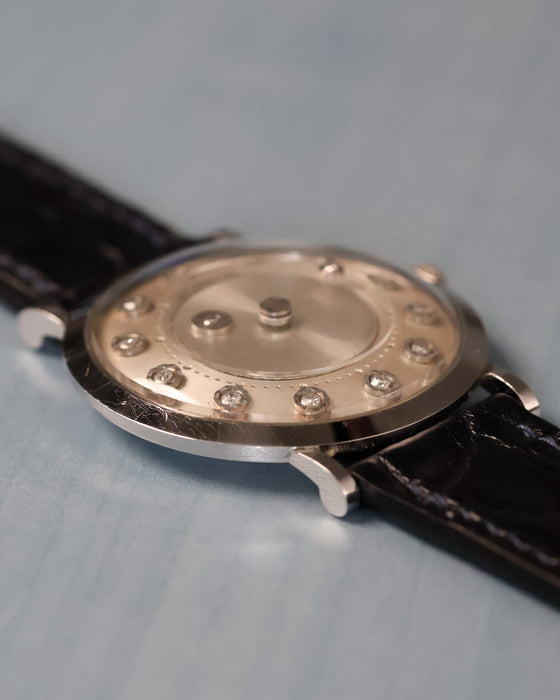 Side profile of the Jaeger-LeCoultre mystery watch highlighting the slim white-gold case and curved lugs