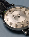 Macro detail of the LeCoultre signature and diamond hour markers on the mystery dial