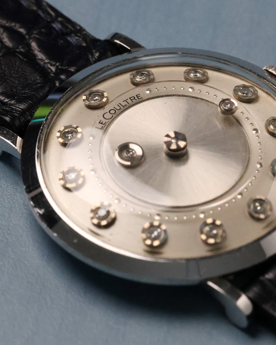 Macro detail of the LeCoultre signature and diamond hour markers on the mystery dial