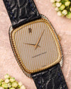Audemars Piguet ref. 4157 CA tonneau watch with snowflake textured dial and yellow gold rope bezel, front view on leather strap.