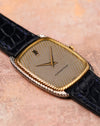 Angled view of Audemars Piguet 4157 CA showing curved tonneau case and two-tone gold construction.