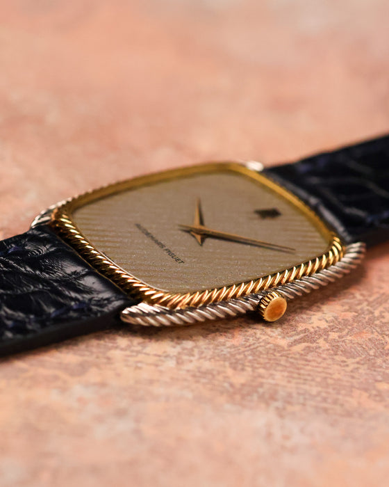 Side profile of Audemars Piguet 4157 CA highlighting slim case and crown detail.