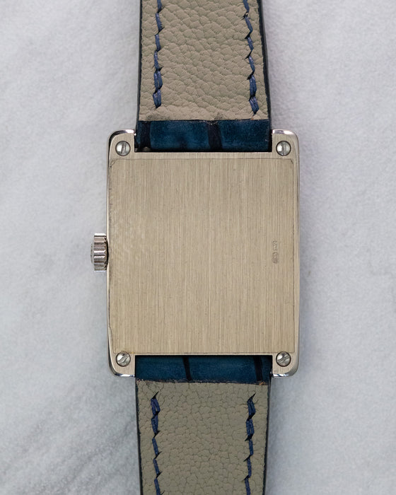 Caseback of Patek Philippe Gondolo 5010 showing brushed rectangular white gold back with screws