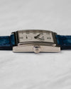 Side profile of Patek Philippe Gondolo 5010 in white gold showing curved rectangular case and crown detail