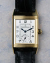 Straight-on view of reverse dial with small seconds and rectangular inner track.