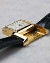 Angled view of the flipped case highlighting interior guilloché pattern and case construction.