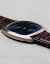 Audemars Piguet Ref. 5279 white gold cushion case side profile showing ultra-thin case and blue dial with brown leather strap