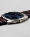 Audemars Piguet Ref. 5279 white gold case side view with crown and blue sunburst dial visible