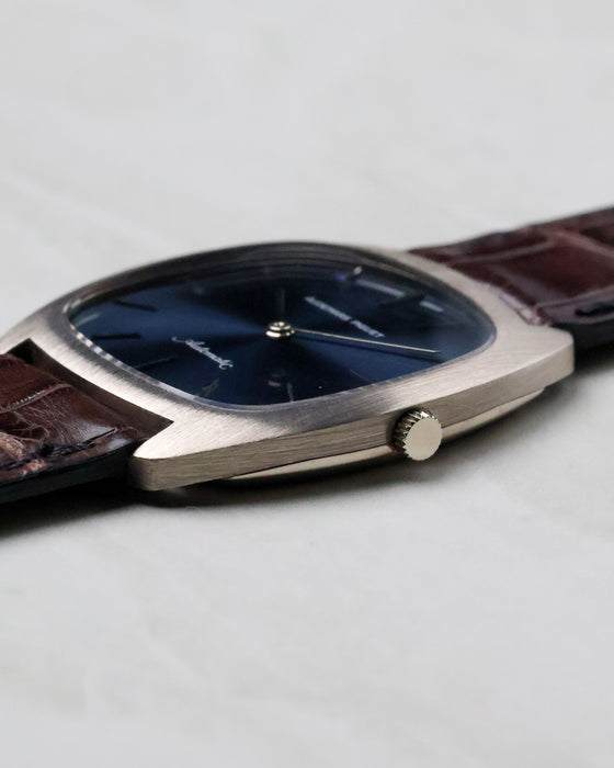 Audemars Piguet Ref. 5279 white gold case side view with crown and blue sunburst dial visible