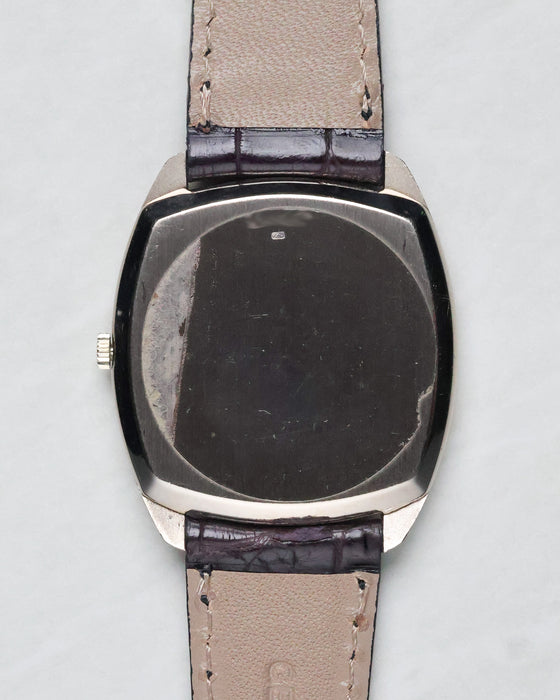 Audemars Piguet Ref. 5279 caseback view in white gold with visible surface wear and leather strap underside