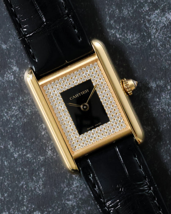 Front view of Cartier Tank LC showing black lacquer centre dial framed by diamond setting.