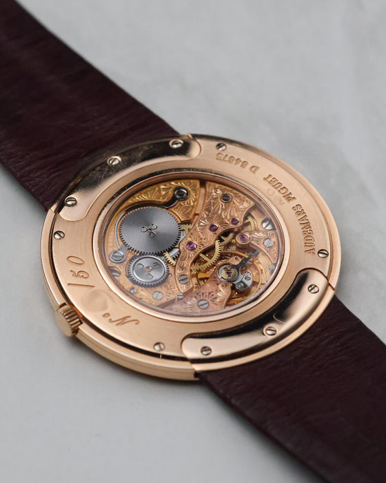 Audemars Piguet 14988OR angled caseback view highlighting decorated movement and rose gold case