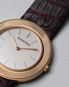 Audemars Piguet 14988OR dial and bezel detail showing hobnail-style textured rose gold finish