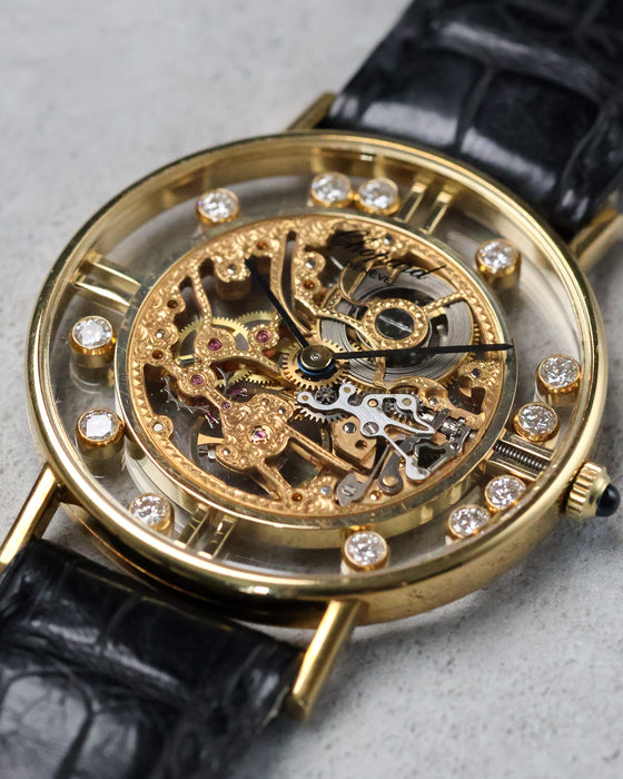 Low angle detail of Chopard L.U.C Happy Diamonds skeleton dial and floating diamonds in gold case.