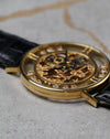 Close-up of Chopard L.U.C Happy Diamonds case side and floating diamonds within sapphire ring.