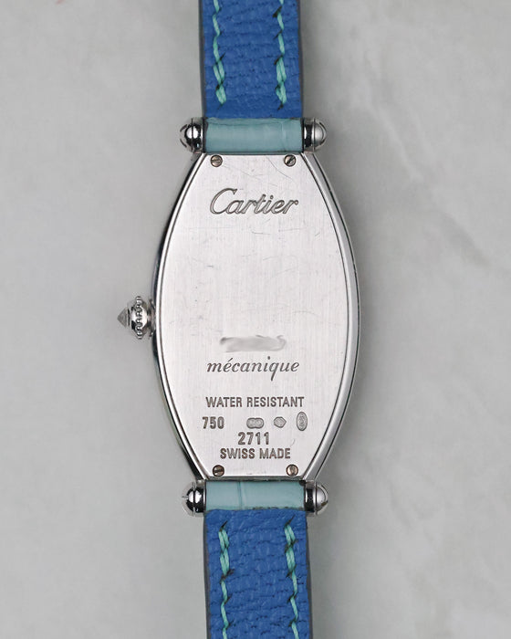 Cartier Tonneau WE400731 caseback in 18k white gold with mécanique engraving and blue leather strap.
