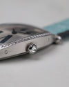 Close-up detail of the Cartier Tonneau WE400731 crown and diamond-set white gold case.