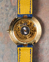 Rear view of the Chaumet Pebble 13A showing the open case back and automatic rotor.