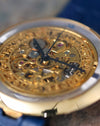 Close-up of the Chaumet Pebble 13A skeletonised dial highlighting the exposed movement and date display.