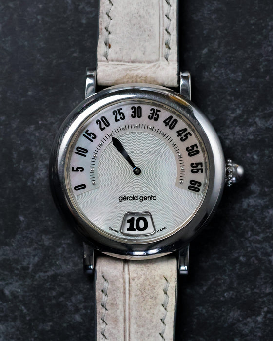 Front view of the Gerald Genta Retro Classic G.3614 with retrograde minute display and jumping hour aperture.
