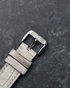 Original steel Gerald Genta buckle paired with the light leather strap of the G.3614.
