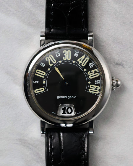 Front view of the Gerald Genta Retro Classic G.3614 with black dial, retrograde minute display and jumping hour aperture.