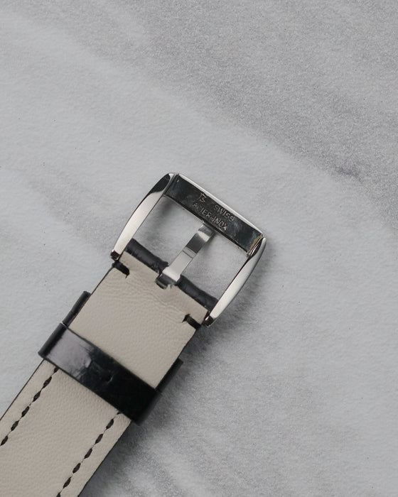 Reverse view of the original steel buckle and black leather strap on the Gerald Genta Retro Classic G.3614.