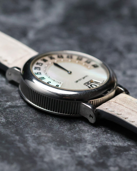 Side profile of the Gerald Genta G.3614 steel case showing the fluted mid-case and mother of pearl dial.