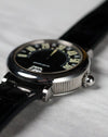 Angled side profile of the Gerald Genta Retro Classic G.3614 showing the fluted steel caseband and crown detail.