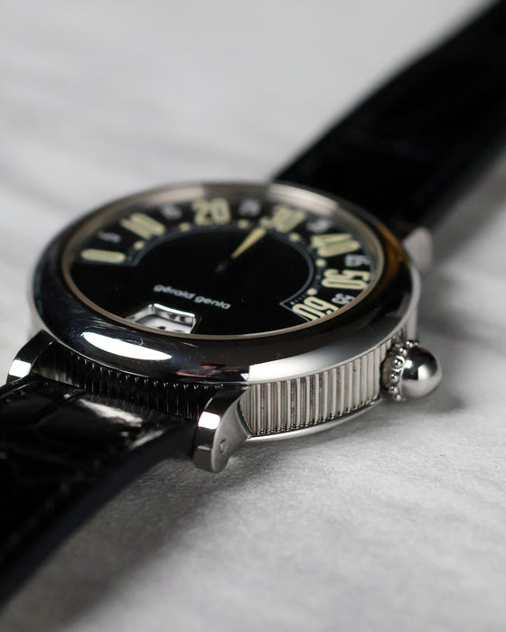 Angled side profile of the Gerald Genta Retro Classic G.3614 showing the fluted steel caseband and crown detail.