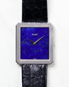 Front view of the Piaget Protocole Ref. 9154 showing its lapis lazuli dial and ribbed white gold bezel.