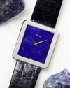 Piaget Protocole Ref. 9154 with lapis dial photographed alongside lapis stone fragments.