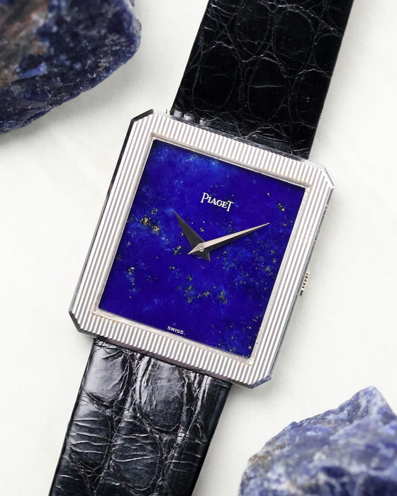 Piaget Protocole Ref. 9154 with lapis dial photographed alongside lapis stone fragments.