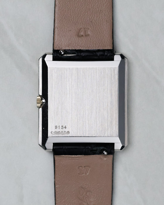 Caseback view of the Piaget Protocole Ref. 9154 in 18k white gold with brushed finish.