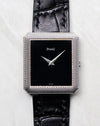 Piaget Protocole Ref. 91546 with black onyx dial and Clous de Paris engraved white gold case shown from the front.