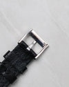 Reverse view of the Piaget signed 18k white gold buckle attached to the strap.