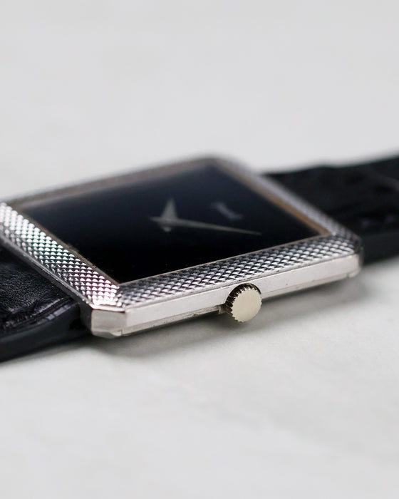 Side profile of the Piaget Protocole Ref. 91546 showing its ultra-thin white gold case and crown.