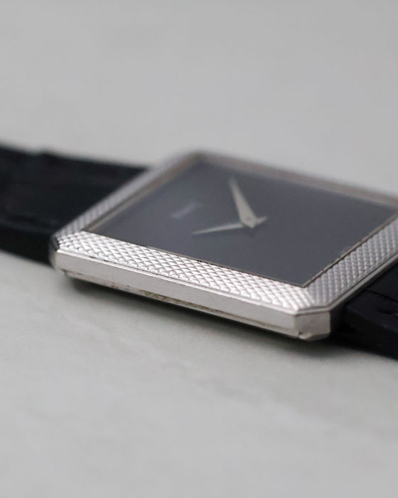 Low-angle detail of the Clous de Paris finished bezel on the Piaget Protocole Ref. 91546.
