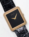 Front three-quarter view of the Piaget Protocole Ref. 8154 with black onyx tapestry dial and ribbed gold bezel.
