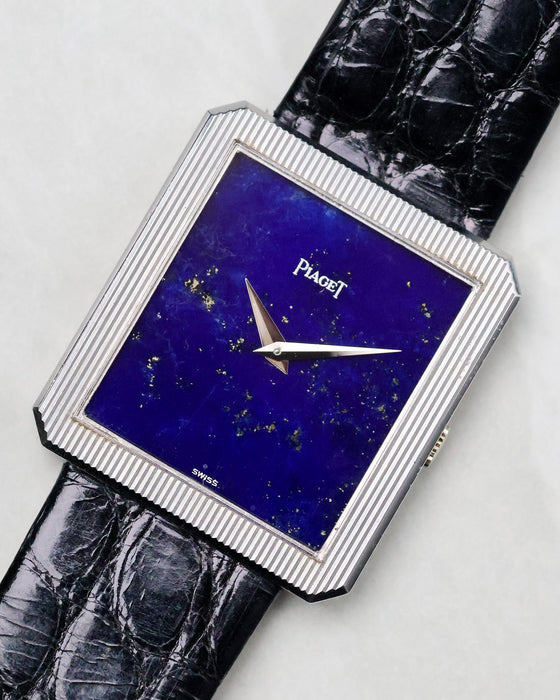 Angled close-up of the Piaget Protocole Ref. 9154 lapis dial and ribbed bezel details.