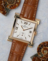 Angled front view of the Vacheron Constantin Carré Historiques Ref. 91030 yellow gold case and silver dial.