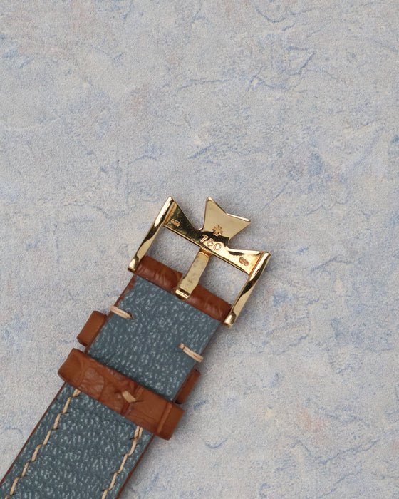 Reverse view of the original yellow gold Vacheron Constantin buckle on the leather strap.