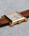 Side profile of the Vacheron Constantin Carré Historiques Ref. 91030 yellow gold case and signed crown.